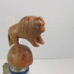 This East African bottle topper is hand carved out of a rare wood and is about 50 years old.